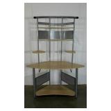 Laminated and tubular metal desk with shelving.