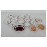 Small porcelain and glass plates, some have