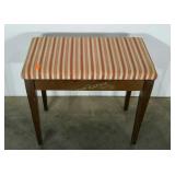 Piano bench, 23" to seat, a bit wobbly, needs