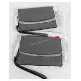 Two wristlet clutch purses, new in wrapping