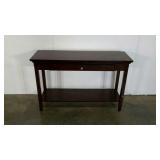 Foyer table with single drawer. A few dings and