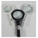 Three lighted magnifying glasses, new with
