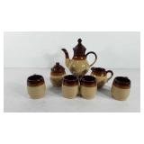 Stoneware tea set, includes tea pot, cream and