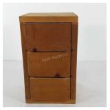 Small wooden cabinet with three drawers, drawers