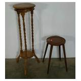 Two plant stands, round bases, tallest measures