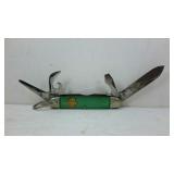Girl Scouts pocket knife with emblem. All tools