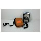 DeJur light meter with leather lanyard case.