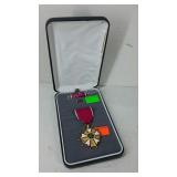 Legion of Merit medal in military case.