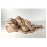 Plaster reclining nude statue, she has lost her