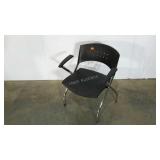 Aluminum and poly chair, marked 