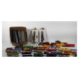 Group of model train cars and tracks