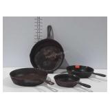 Four cast iron skillets, needs pre-seasoned