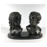 Pair of bust statues on shared marble base, busts