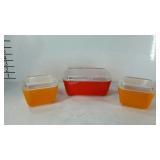 Set of three Pyrex refrigerator dishes with lids,