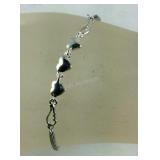 Sterling silver and stainless heart bolo bracelet