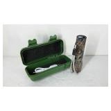 Camo, 4" rechargeable LED flashlight in storage