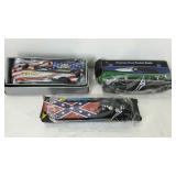 Group of three pocket knives, all with boxes.