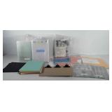 File box full of scrapbooking supplies, paper,