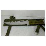 Survival style knife in fabric sheath. 7" blade.