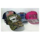 Four assorted ball caps, all new, some with tags.