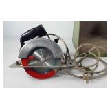 Tools, power hand saw with metal case, powers up