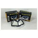 Two Solar Interaction wall lamps, new in box.