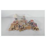 Small storage bin of wooden block stamps,