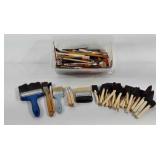 Paint brushes, some foam brushes, some used and