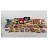 Twenty-seven die-cast metal cars in packaging,