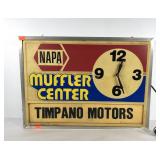 Advertising Napa Muffler Center light with clock,