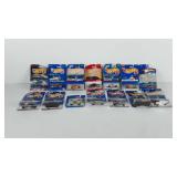 Fourteen die-cast metal hotwheels cars in