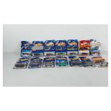 Fourteen die-cast metal hotwheels cars in