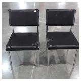 Pair of Chairs, black fabric and vinyl seating,