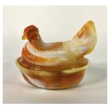 Orange and white slag glass hen on nest, 7"