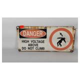 Metal high voltage danger sign, damage as shown,