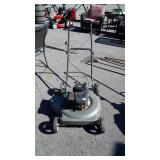 Craftsman push mower, with Briggs Engine, running