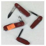 Four Swiss pocket knives