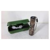 Camo, 4" rechargeable LED flashlight in storage