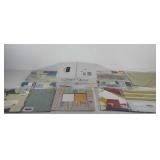 Art supplies, two boxes of scrapbooking paper