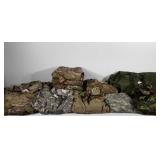 Group of military clothing, includes shirts,