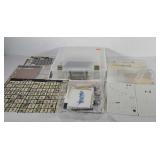 Art supplies, storage bin of scrap booking paper,