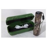 Camo, 4" rechargeable LED flashlight in storage