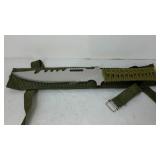 Survival style knife in fabric sheath. 7" blade.