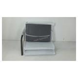 Three wristlet clutch purses, new in wrapping.