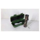 Camo, 4" rechargeable LED flashlight in storage