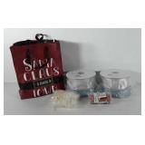 Holiday ribbon, gift bag, twine, and snowflake