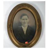 Early portrait picture in frame with convex