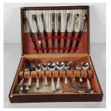 Wooden flatware chest with flatware, chest shows