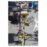 3 work lights. Two on tall stands, non-tested