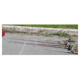 7 fishing poles, 5 with reels